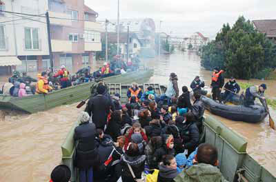 Serbians fortify riverbank as high water approaches