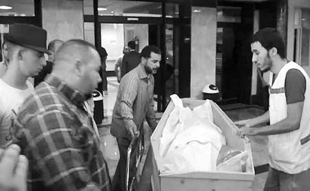 Gunmen kill Swiss worker, attack PM's office in Libya