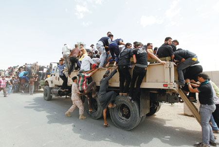 Iraqi rebels seize two more towns