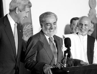 Afghan rivals agree to resolve dispute over votes