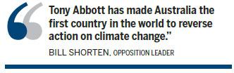 Australia abolishes divisive carbon tax; PM dubbed 'environmental vandal'