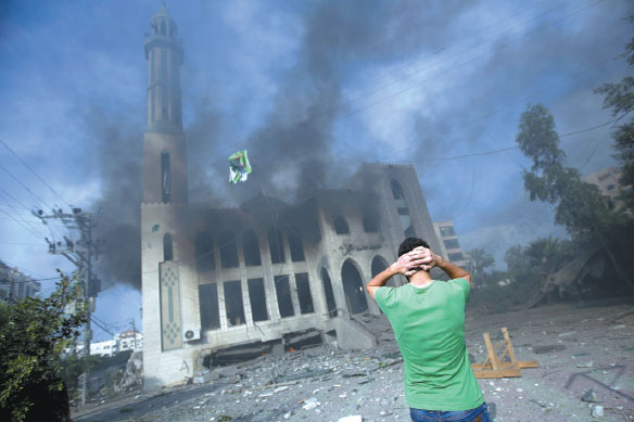 Israel attacks symbols of Hamas power in Gaza