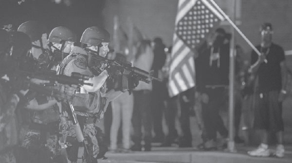 Riot police face heavy gunfire