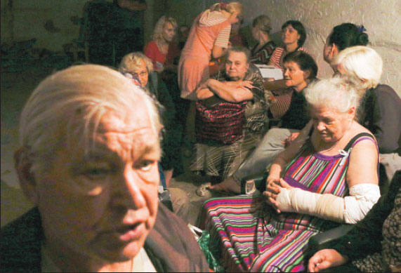 Ukrainian forces press attacks on rebel-held areas