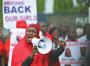 Anxious families wait and hope after 'deal' over kidnapped girls