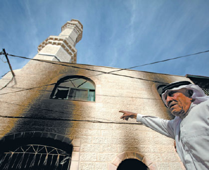 West Bank fire attack damages mosque