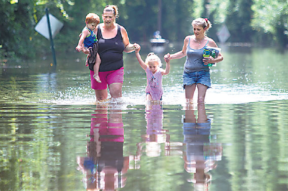 Hundreds seek safety from Texas floods; severe weather kills 17