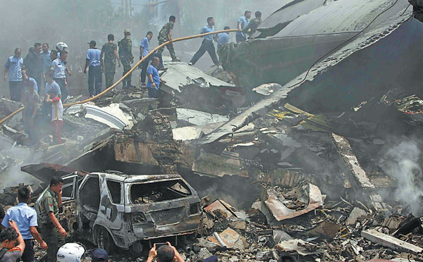 Military plane crashes into residential area, killing 113