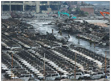 Vehicles damaged in Tianjin blasts sold in auctions