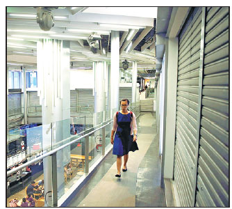 Malls in international shopping haven suffer as locals, tourists curb spending