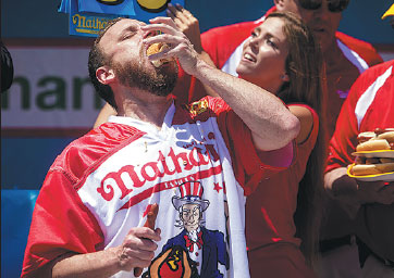 Hot dog-eating champ tastes victory again