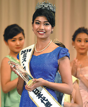 Half-Indian 'elephant whisperer' crowned Miss Japan