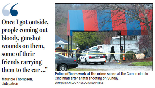 Police search for suspects in nightclub shooting