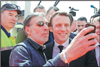 Polls pointing to Macron landslide