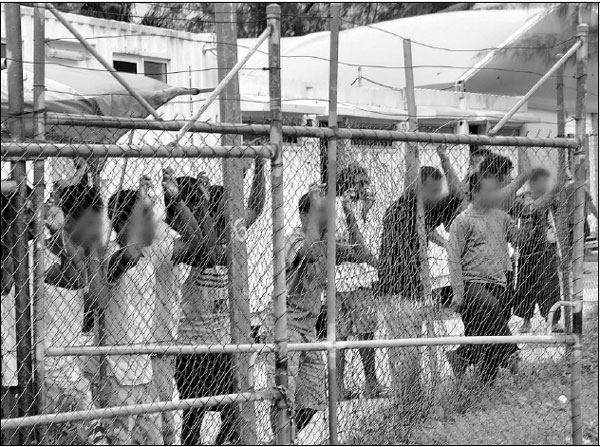 Asylum-seekers win legal damages