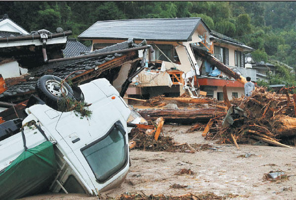 Floods sweep south Japan, at least 2 dead, 18 missing