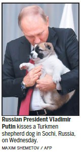 Dog lover Putin gets pup as gift