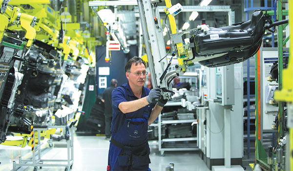 Daimler, Bosch hit by walkouts in industry-wide labor dispute