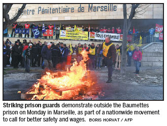 French prison guards strike in dispute over conditions and pay