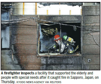 Blaze kills 11 in welfare dormitory
