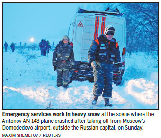 Investigators begin grim crash search