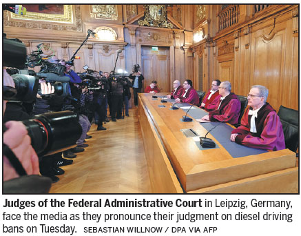 Cheers, protests as German court lets cities ban diesel cars