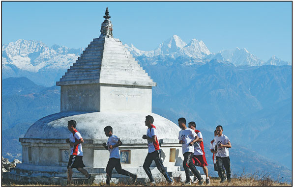 Monks trade robes for running shoes