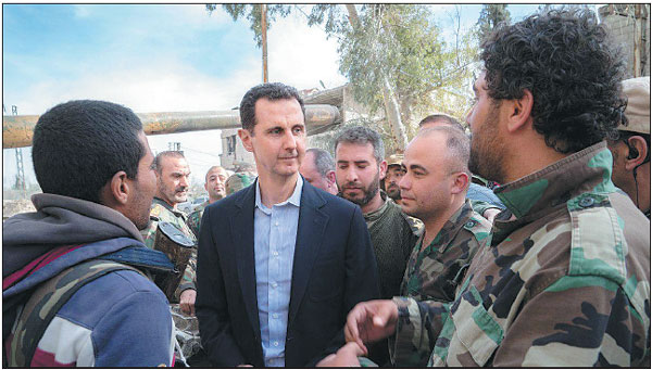 Assad visits army in eastern Ghouta
