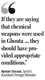 Chemical weapons team collect samples from site