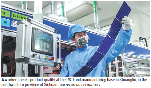 TOP PHOTOGRAPHERS TURN LENS ON FIRM'S CLEAN-ENERGY DRIVE