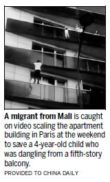 Paris toddler rescued by 'Spiderman of the 18th'