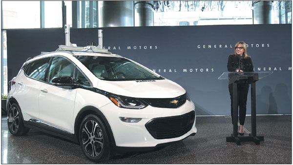 GM shares soar as SoftBank joins in self-driving auto race