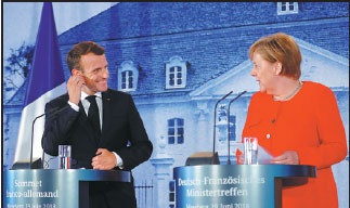 Merkel, Macron welcome 'new chapter'