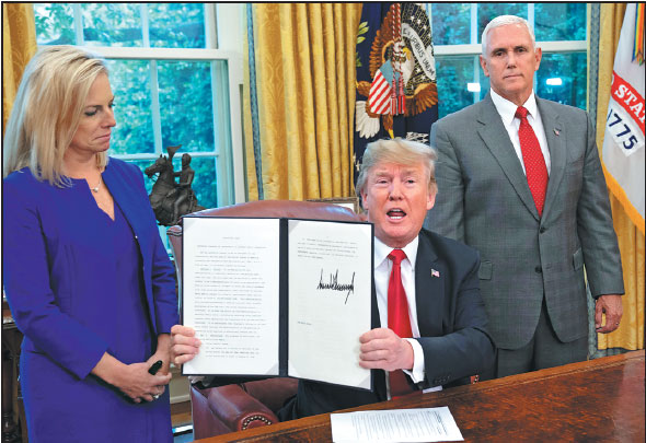 Trump backs down on immigration policy but legal challenges remain