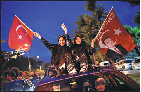 Erdogan celebrates poll triumph