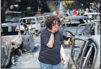Death toll from wildfires near Athens rises to 80