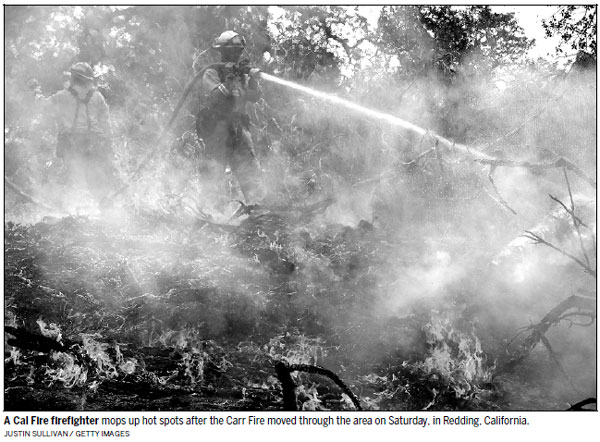 Death toll from California fire grows to five as blistering blaze rages on
