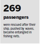 Tangled ship freed from nets after storm