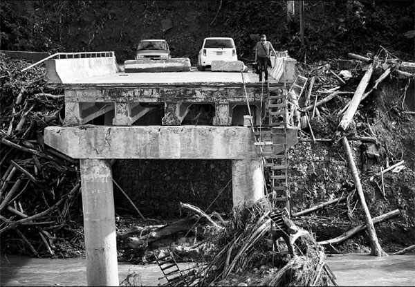 Hurricane's toll raised to 2,975