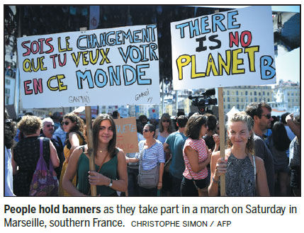 Marches urge action on climate change