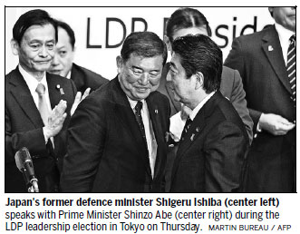 Abe aims to create 'new nation' after sealing third term