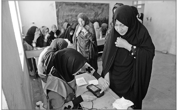 Chaotic Afghan polls drag into day 2
