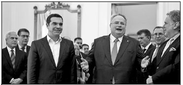 Greek PM Tsipras sworn in as foreign minister after resignation