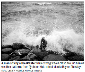 Hunt for landslide victims as typhoon toll rises