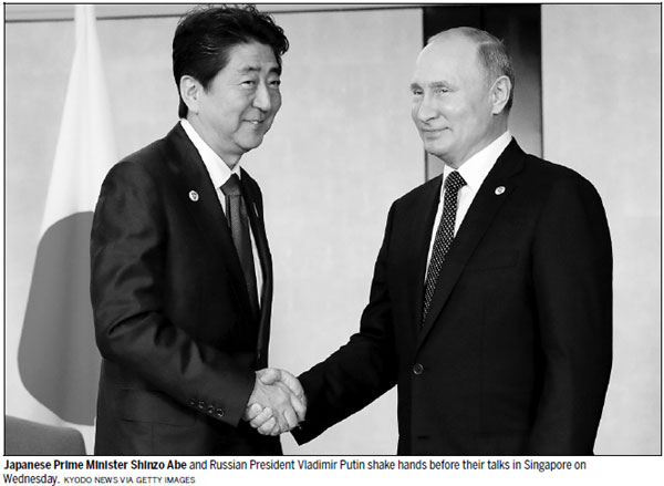 Putin, Abe agree to peace treaty talks