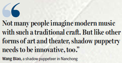 Traditional shadow puppeteers carry tradition forward