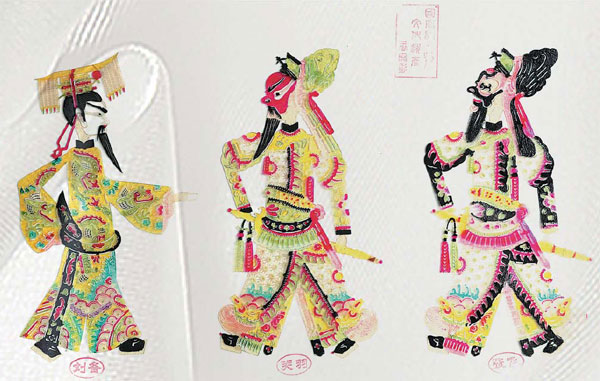 Traditional shadow puppeteers carry tradition forward
