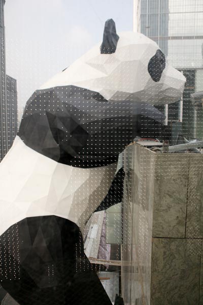Giant panda scales Chengdu mall