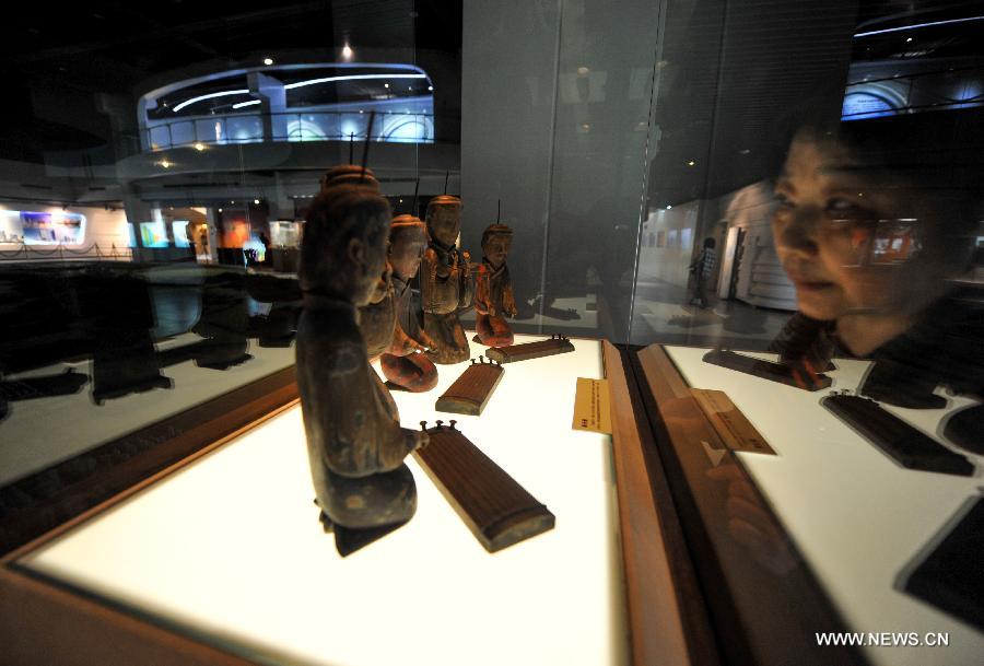 Cultural relics from ancient tombs exhibited in Changsha