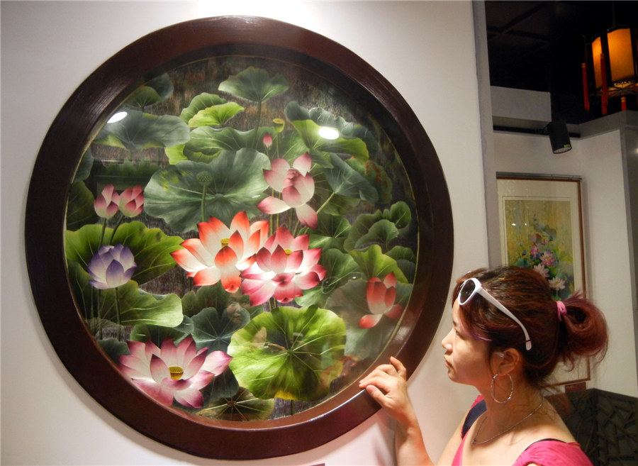 Embroidered lotus blossoms in Suzhou